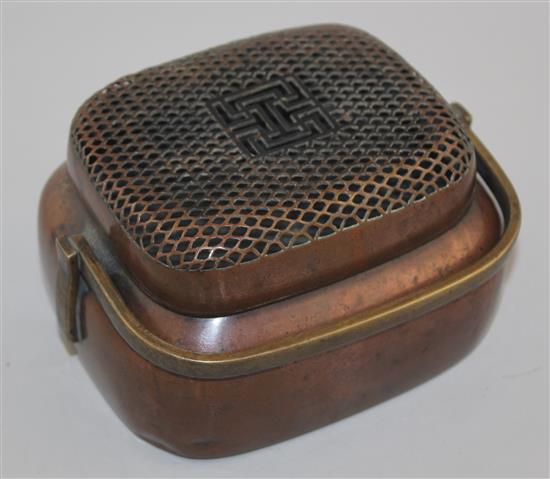 A Chinese copper bronze oblong hand warmer, 18th / 19th century, 15cm